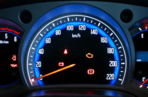 vehicle dashboard with warning lights