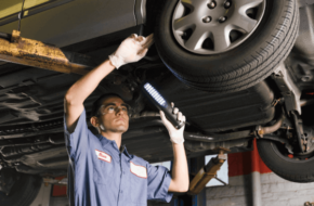 Mechanic completing a tire inspection