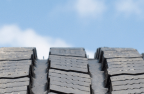 Tire tread against a sky background