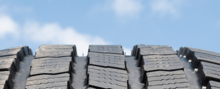 Tire tread against a sky background