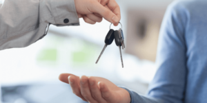 Person handing keys to the mechanic