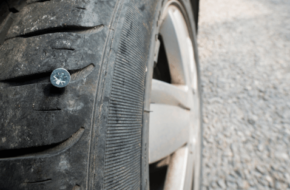 Picture of a screw puncturing a tire