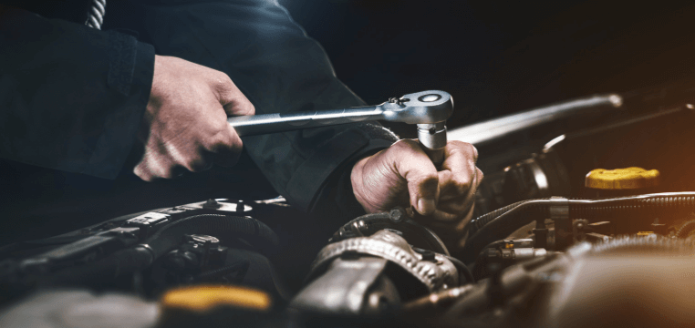 Mechanic repairing an engine