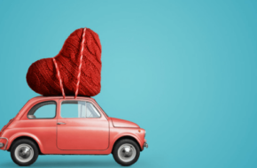 Valentine's Day car carrying oversized heart