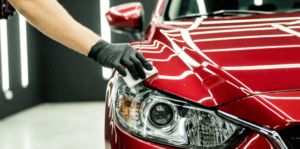 Expert mobile detailing a red car