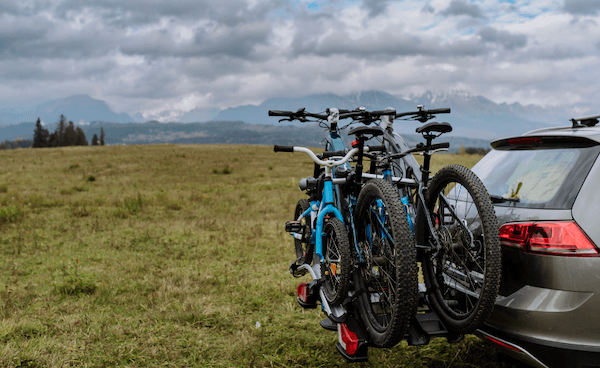 Bike rack connected by a trailer hitch