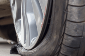 Close up photo of a blown tire