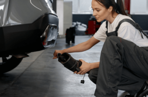 Woman performs car emissions testing