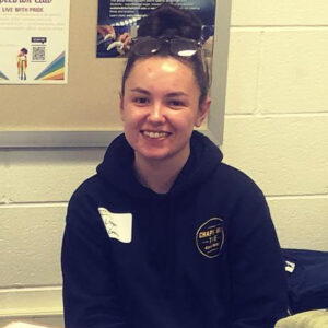 Chapel Hill Tire staff member smiling at camera