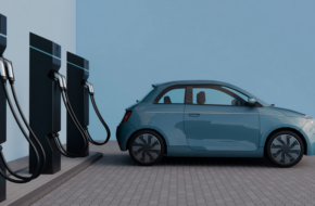 electric vehicle parked in front of a row of EV chargers