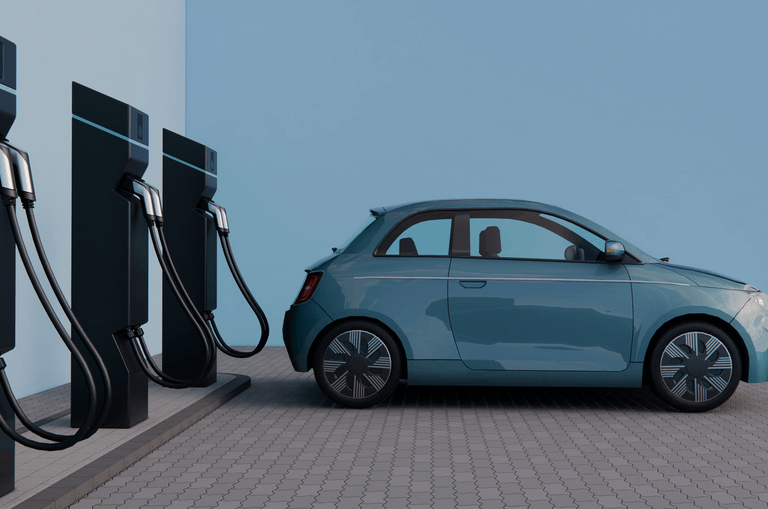electric vehicle parked in front of a row of EV chargers